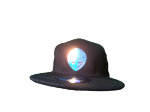 The Hat from the Hologram Moon Collection by Alien Gear Planet is a stylish and unique accessory. Made from 100% acrylic knit fabric, this black hat features a glow-in-the-dark design that's sure to captivate you with it's luminous extraterrestrial glow. Perfect for any occasion, this unique hat is designed for unisex adults and features an adjustable design for added comfort. Designed by the music artist Roksta, this beanie is a must-have for fans or anyone looking to add a touch of alien-inspired style to their wardrobe.

Glow In The Dark
65% Cotton, 35% Polyester
Snap closure
Hand Wash Only
Adjustable Snapback

One Size fits Most Head Sizes Roksta